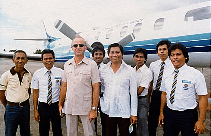 1980 at Manila airport, Philippines, with Stillwell's local agents during Demo Tour of Metro 2, N1015B.